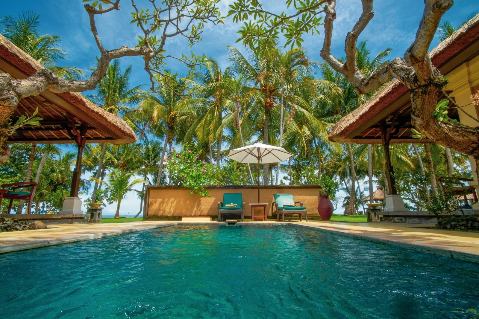 Private beachfront and built in traditional Balinese thatched roof architecture